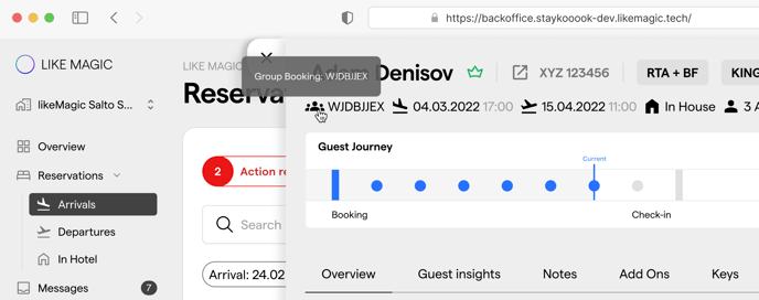 The reservation detail drawer header with the group booking tag next to the guest name