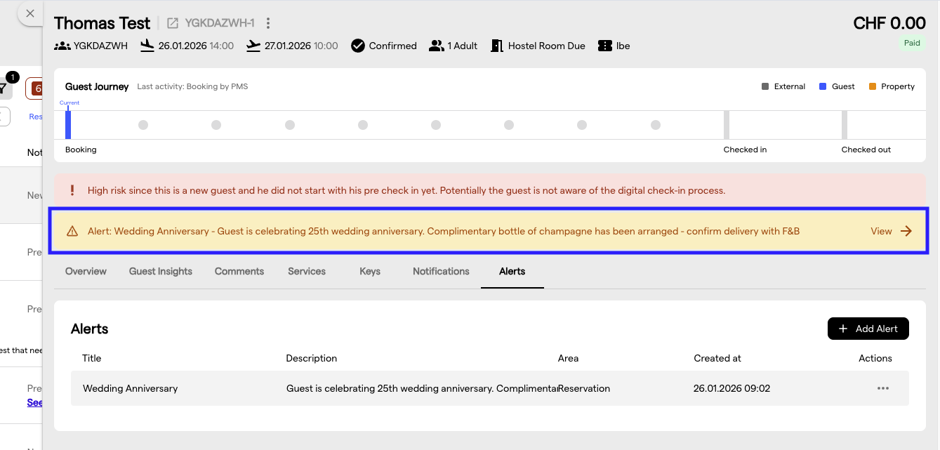An alert as a warning banner above the tabs, with the View link