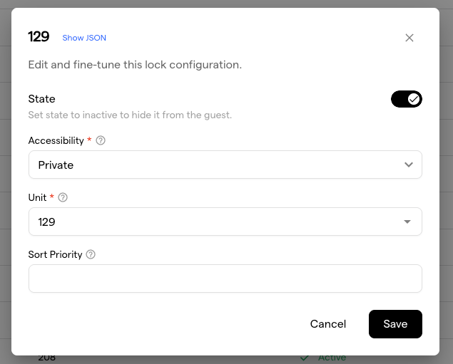 The lock configuration dialog for lock 129, with Accessibility set to Private and Unit 129 assigned