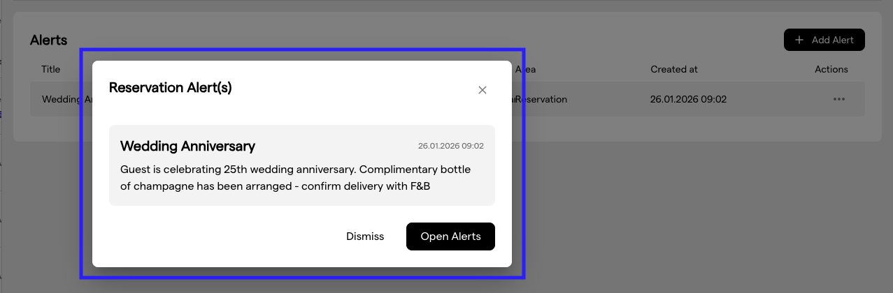 The Reservation Alert(s) pop-up with the alert text and the Dismiss and Open Alerts buttons